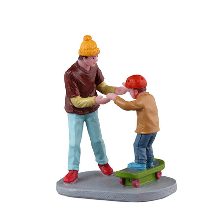 Statuetta per villaggio di Natale "Skater principiante" set da 2 pezzi, in resina