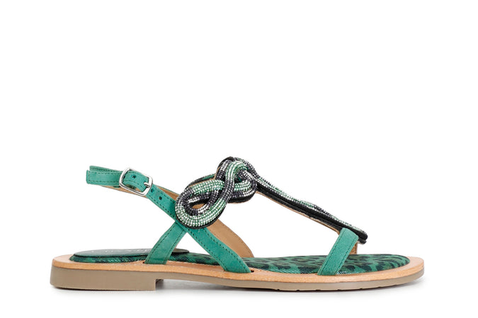 SANDALO INFRADITO IN CAMOSCIO E STAMPA MACULATA CON ACCESSORIO STRASS