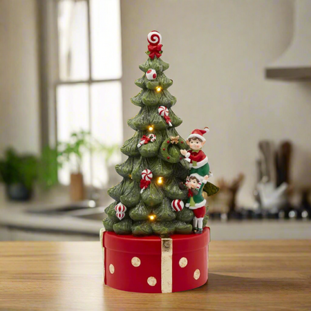 Pino di Natale con elfi, carillon con led luminosi in poliresina h 37 cm