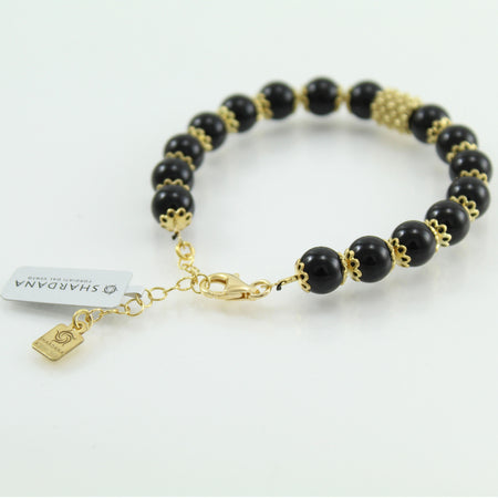 Bracciale portafortuna Su Coccu sfere onice e filigrana d'argento dorato 8 mm