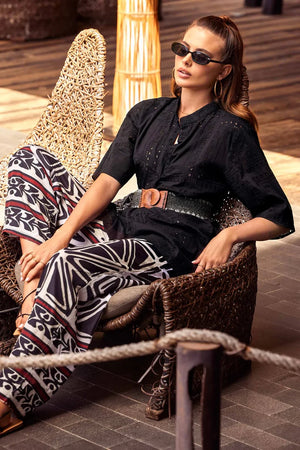ICONIQUE | Pantalone palazzo fantasia geometrica