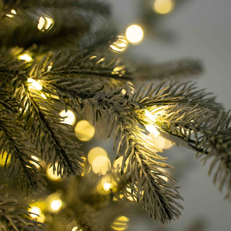 Albero di Natale innevato "Nikolai" con Micro led in PE Effetto Real Touch + PVC + Flock