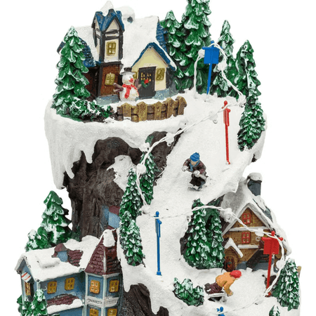 Villaggio Innevato con Sciatori, Trenino in Galleria in movimento in Polyresina, h 38 cm