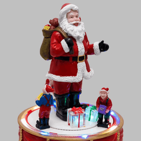 Babbo Natale con Elfi in movimento rotatorio, h 19 cm, musiche natalizie