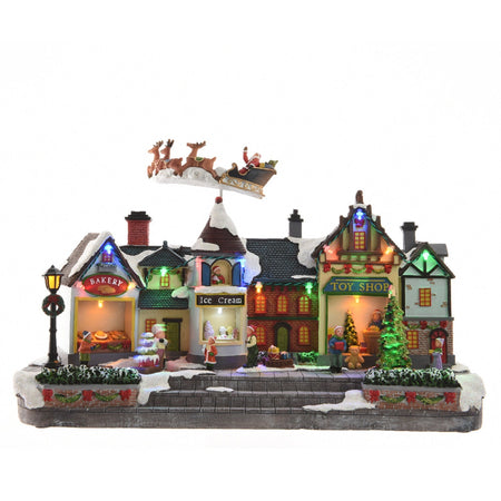 Scena animata a Led con negozi e babbo natale con renne con luci 27 cm