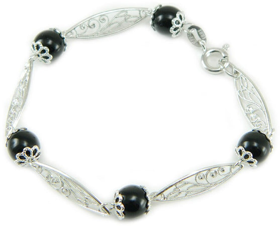 Bracciale Su Coccu e rombi traforati in filigrana sarda argento portafortuna Sardegna