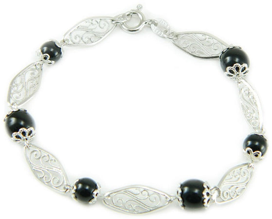 Bracciale Su Coccu e rombi traforati in filigrana argento portafortuna Sardegna