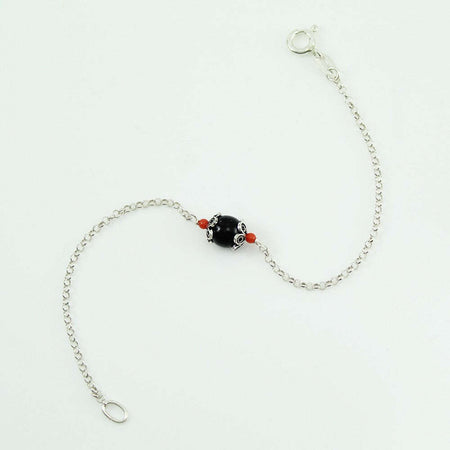 Bracciale in argento Su Coccu con onice e coralli portafortuna Sardegna