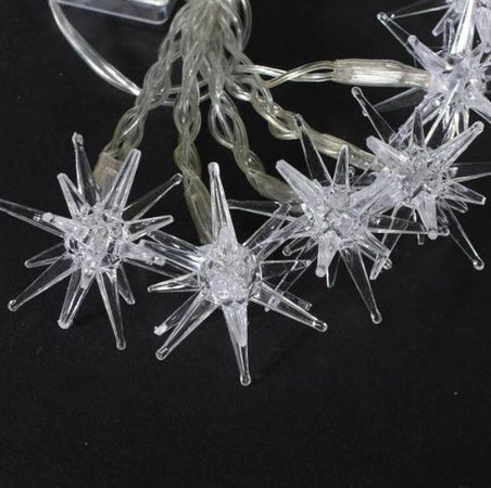 Catena luminosa con 20 stelle trasparenti luce fredda per uso interno 3,5 mt