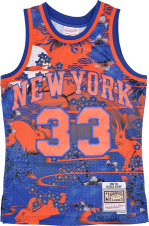 MITCHELL-&-NESS-Canotta-Basket-Uomo-Nba-Ah-Swingman-Jersey-5.0-Hardwood-Classics-1985-No-33-Patrick-Ewing-Neykni-Blue/orange-da-uomo