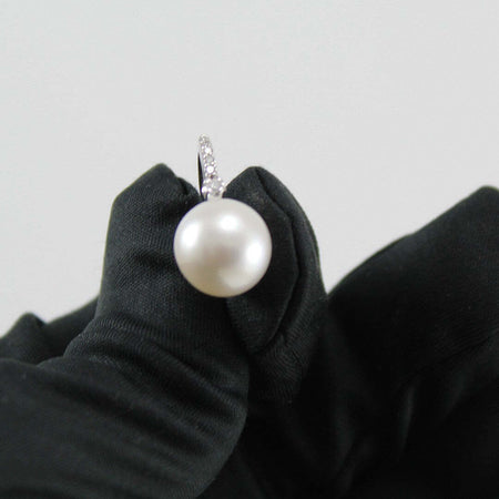 Orecchini perle Australiane monachella in oro bianco e diamanti Coscia