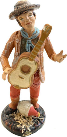 Pastore con chitarra statuetta in terracotta artigianale per presepe napoletano da h 14 cm Casa e cucina/Decorazioni per interni/Addobbi e decorazioni per ricorrenze/Decorazioni natalizie/Presepi/Statuine e fondali per il presepe MagiediNatale.it - Altamura, Commerciovirtuoso.it