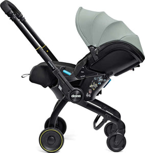 Seggiolino-Auto-e-Passeggino-Doona-X-I-size