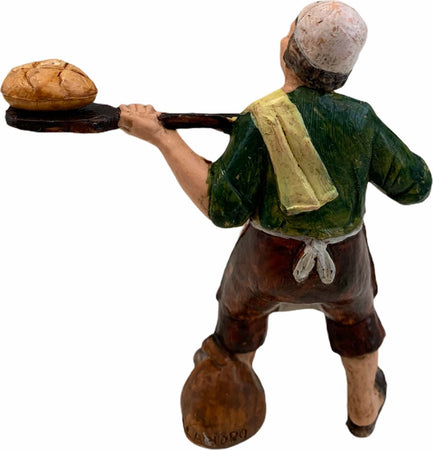 Statuetta per presepe natalizio panettiere che sforna il pane con una pala h 10 cm Casa e cucina/Decorazioni per interni/Addobbi e decorazioni per ricorrenze/Decorazioni natalizie/Presepi/Statuine e fondali per il presepe MagiediNatale.it - Altamura, Commerciovirtuoso.it
