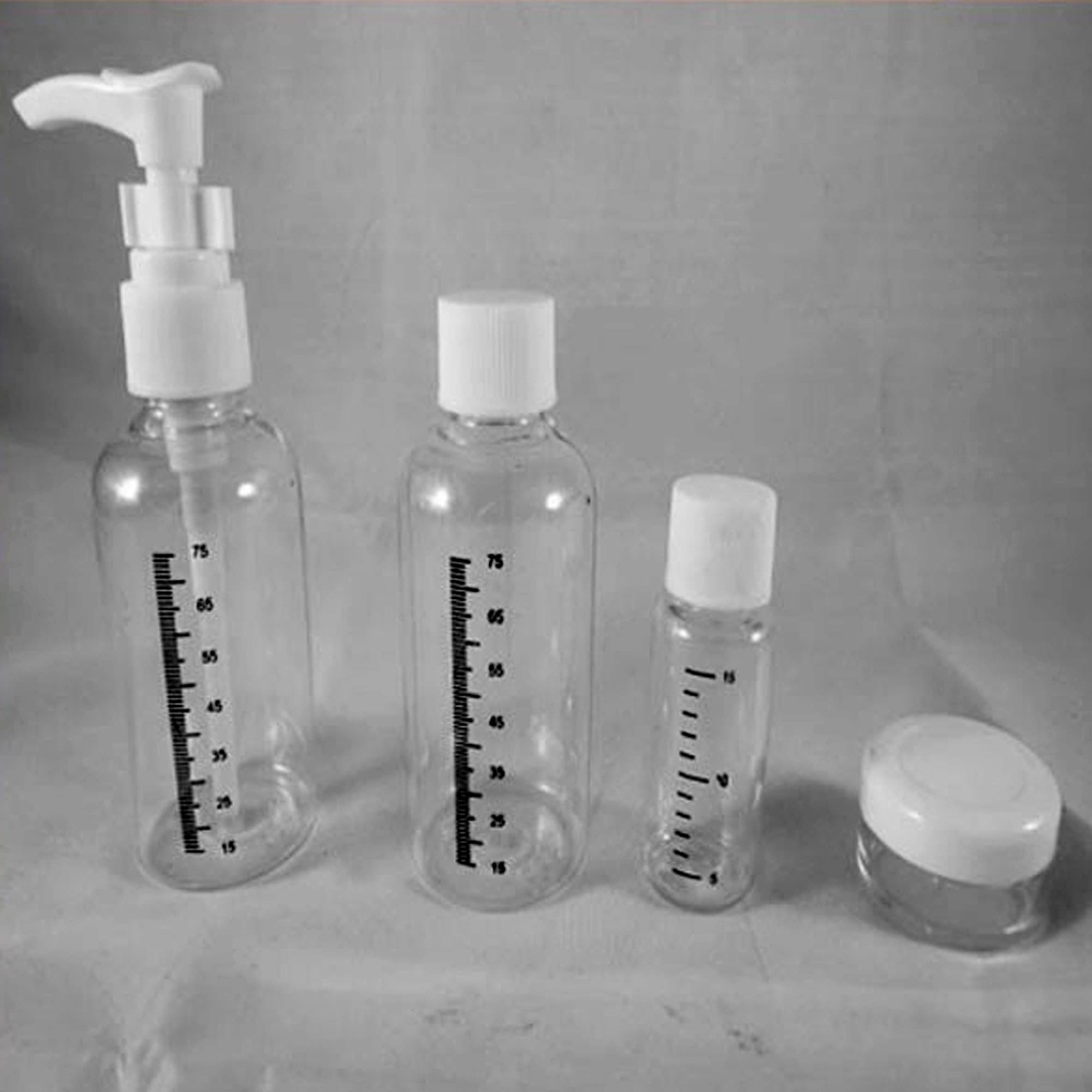 SET 4 CONTENITORI CON SACCHETTO CHECK IN AEREO VIAGGIO CREME LIQUIDI TRAVEL