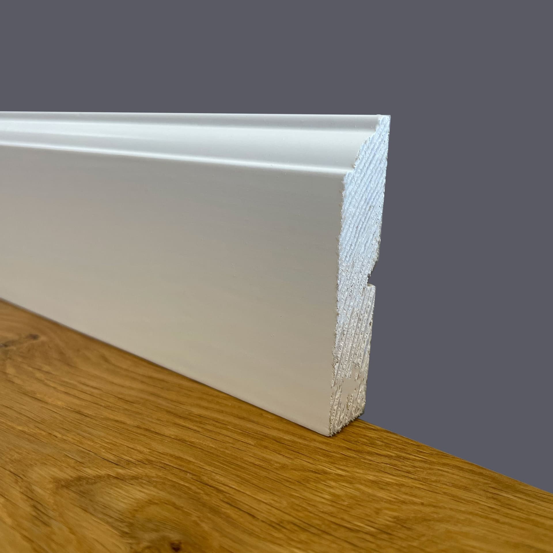 100 metri lineari di Battiscopa PREMIUM in legno MASSELLO mod.FIRENZE 68x15 laccato bianco liscio - Eternal Parquet