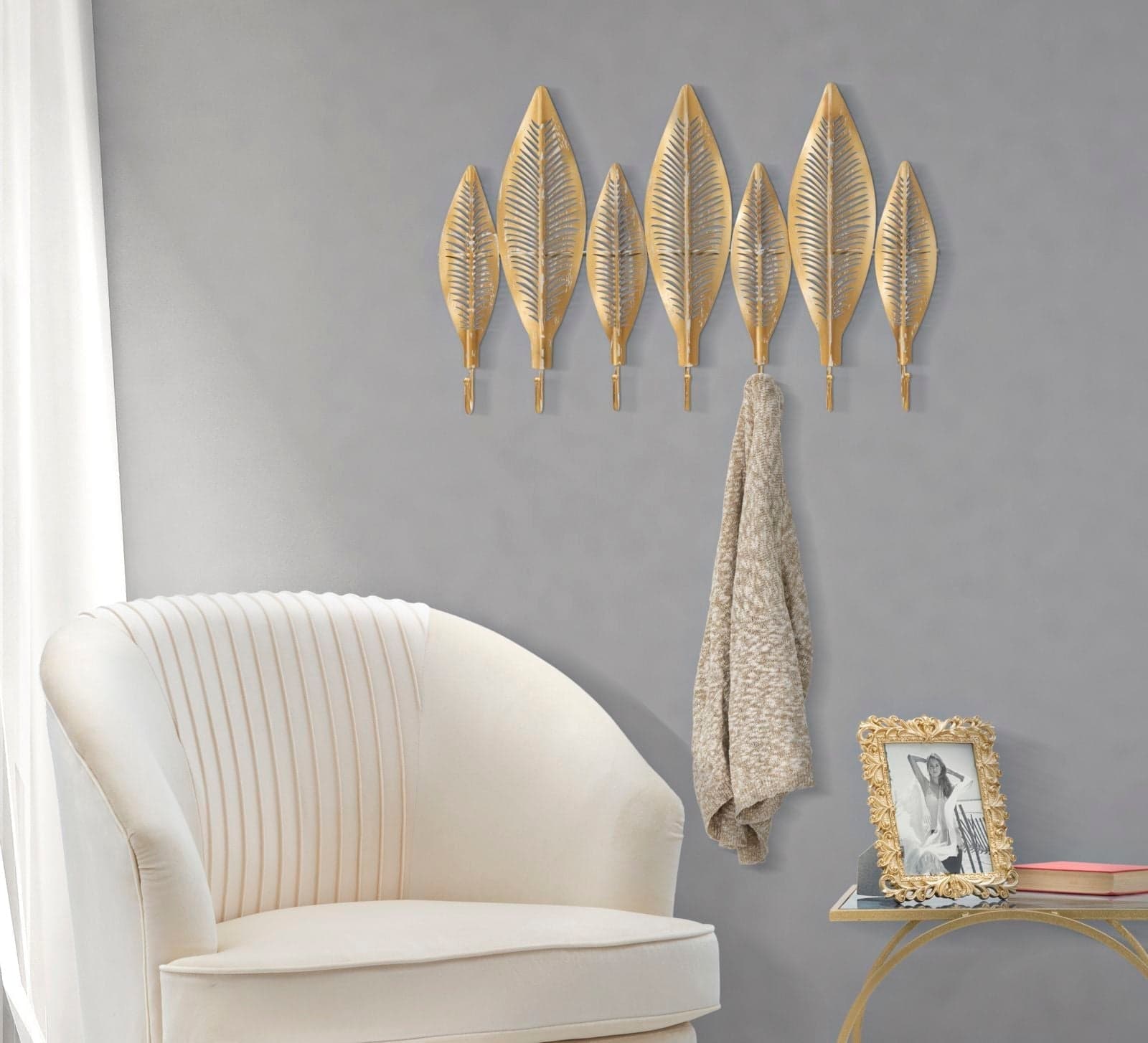 Appendiabiti da parete foglie struttura in metallo color oro con 7 ganci per interni in Appendiabiti Decor Space - Altamura, commercioVirtuoso.it
