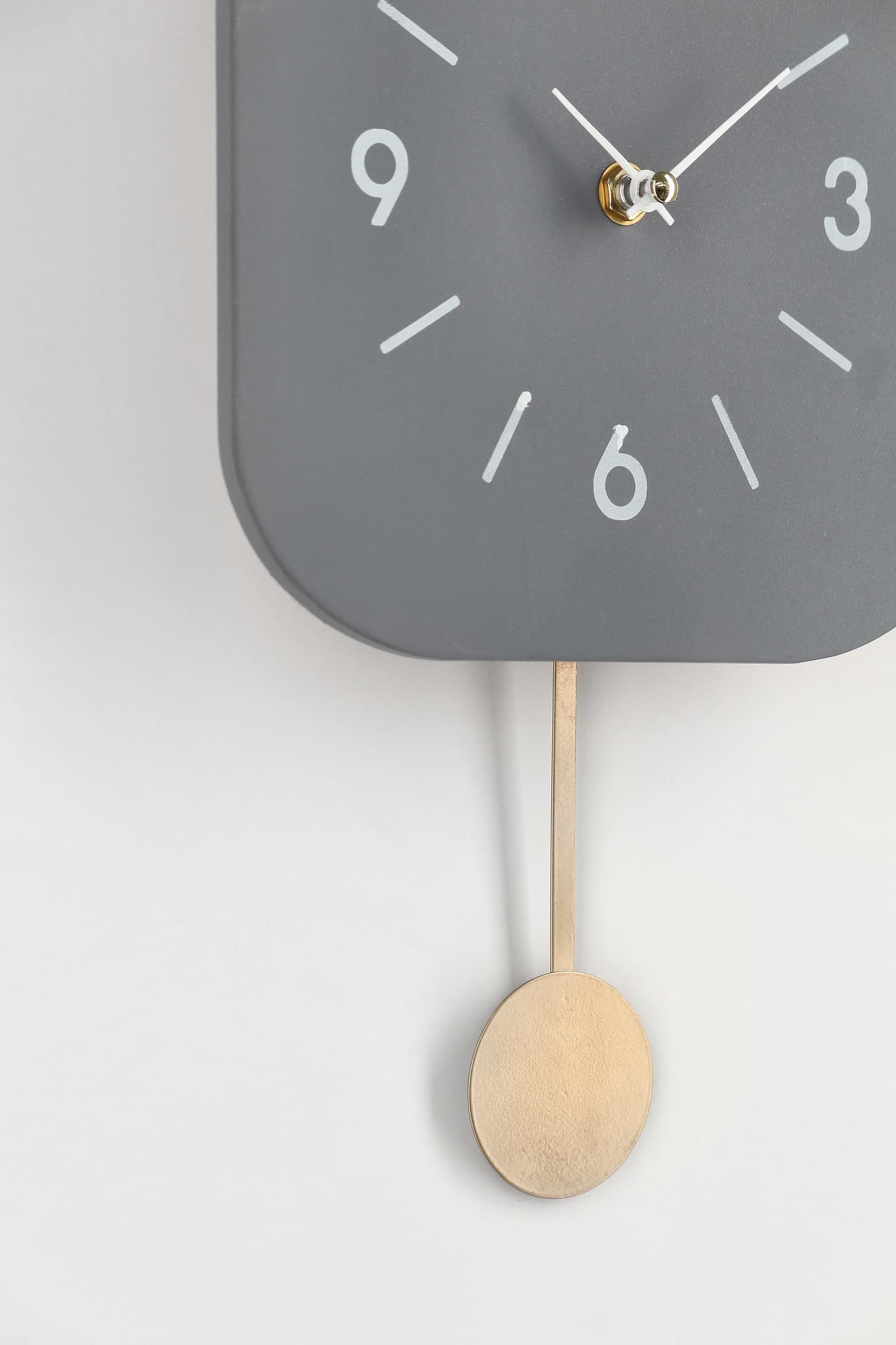 Orologio da parete "Home" con pendolo in acciaio a batteria 24x5,5x37,5 h cm in Orologi da parete Decor Space - Altamura, commercioVirtuoso.it