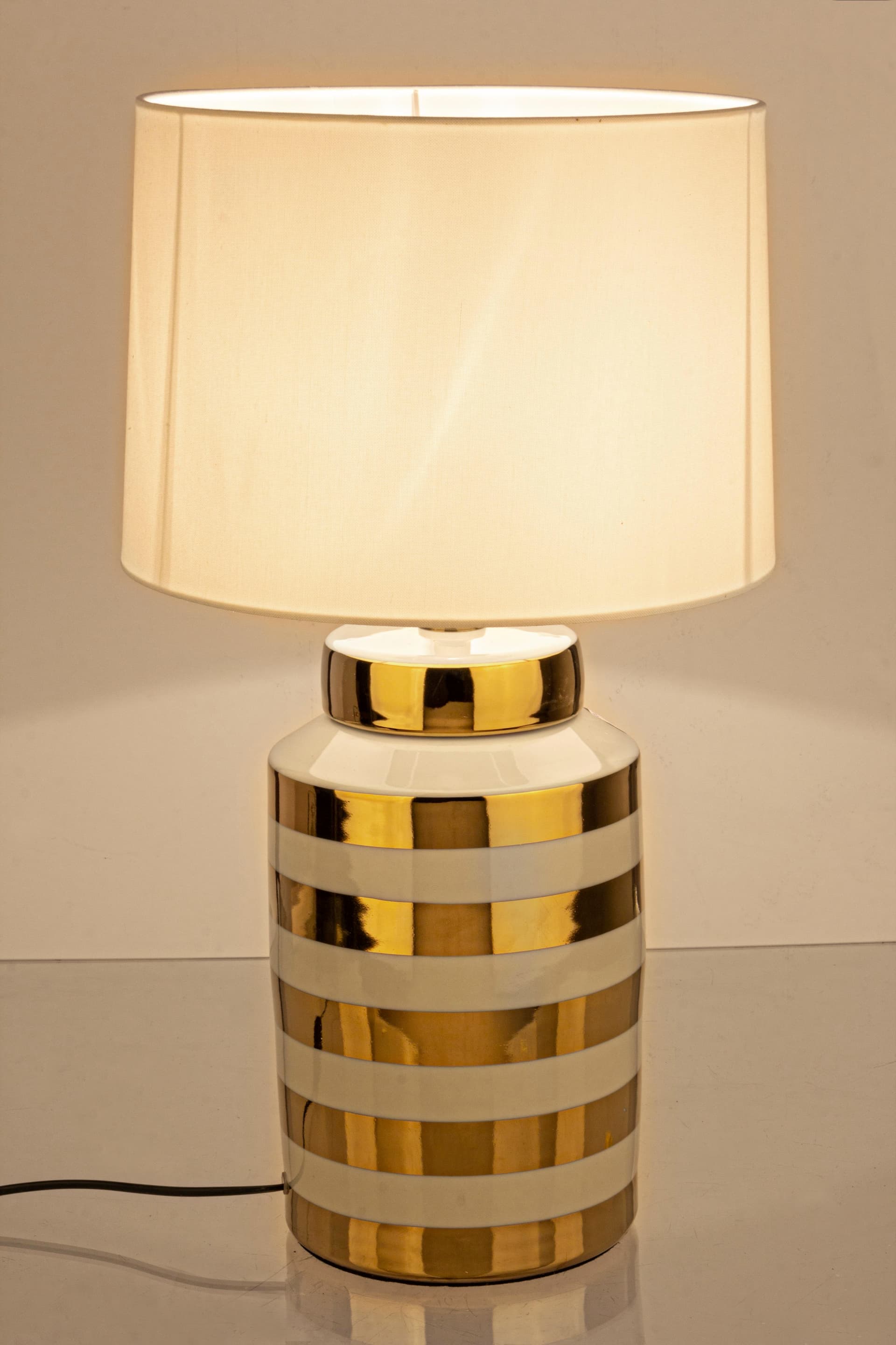 Lampada da tavolo "Honey" in porcellana e poliestere h 63 cm in Lampade da tavolo e abat-jour Decor Space - Altamura, commercioVirtuoso.it