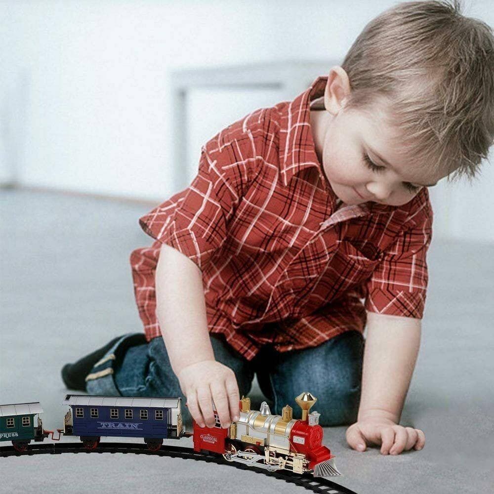 PISTA TRENINO GIOCATTOLO BAMBINI TRENO LOCOMOTIVA CON FUMO LUCE SUONI E 2 VAGONI - 5