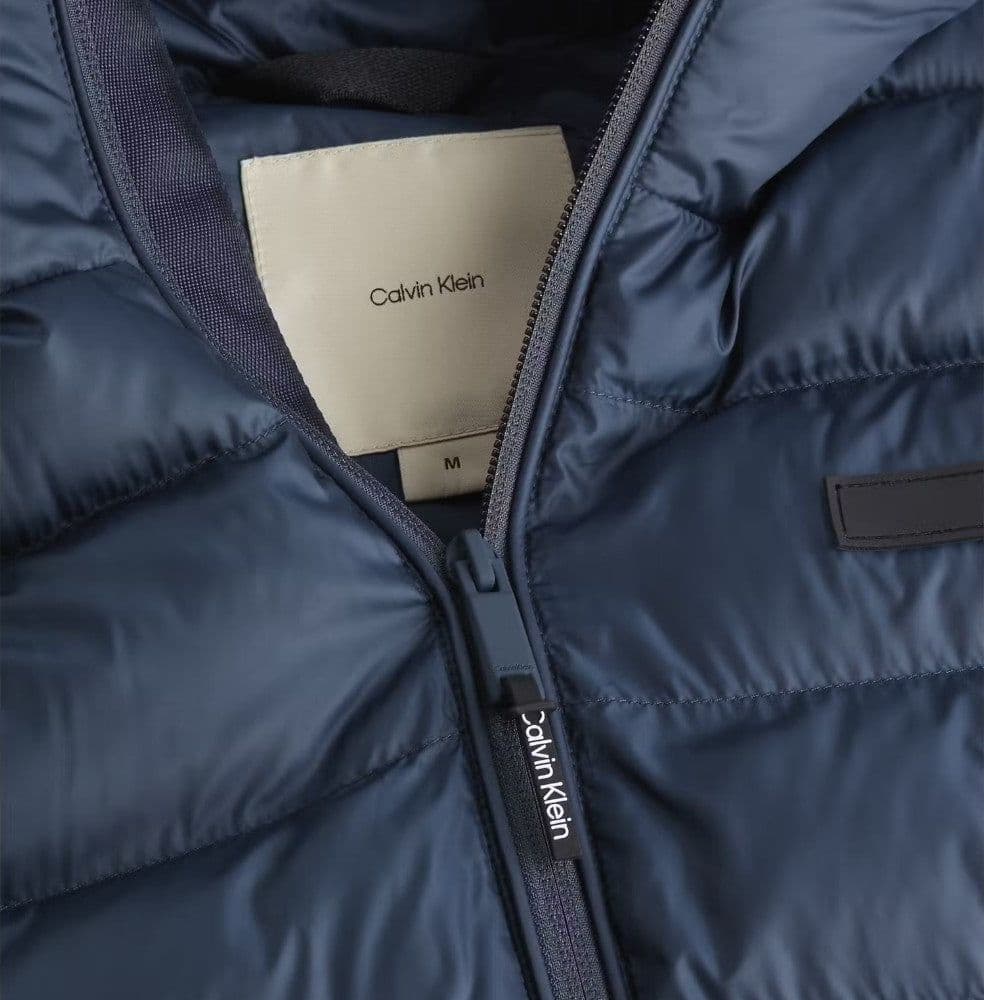Calvin Klein piumino blu con cappuccio Puffer K10K113908PPK Giubbini Calvin Klein