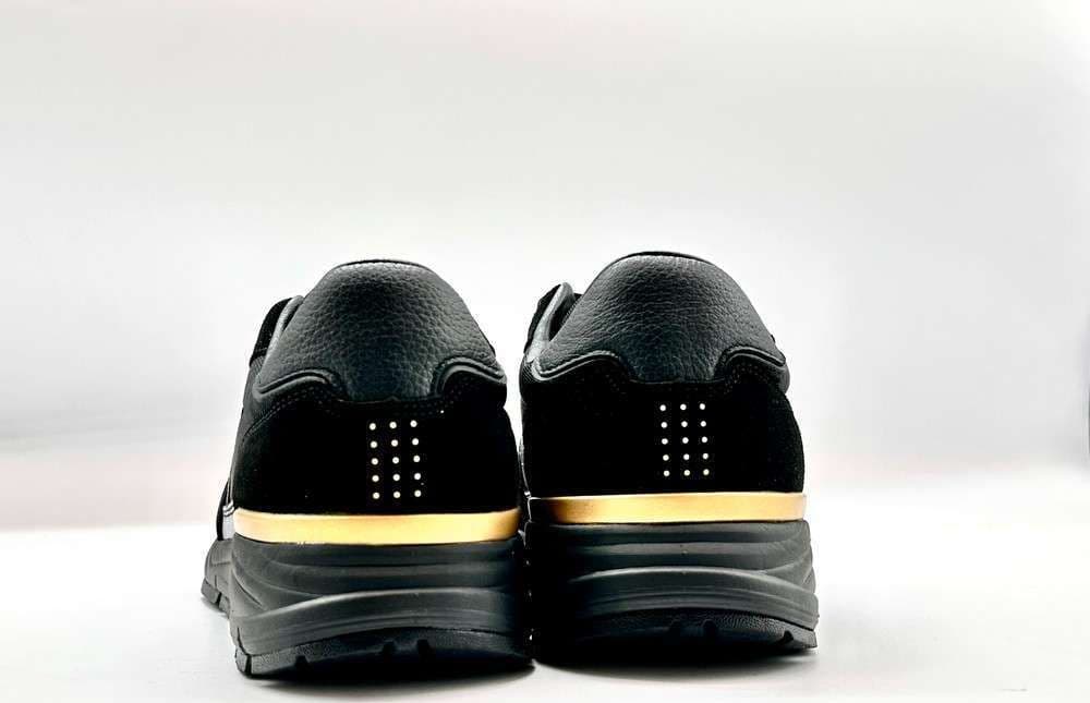 LAMBORGHINI Sneakers running nera e oro loggata in Scarpe da corsa su strada Calzature Durello - Agna, commercioVirtuoso.it