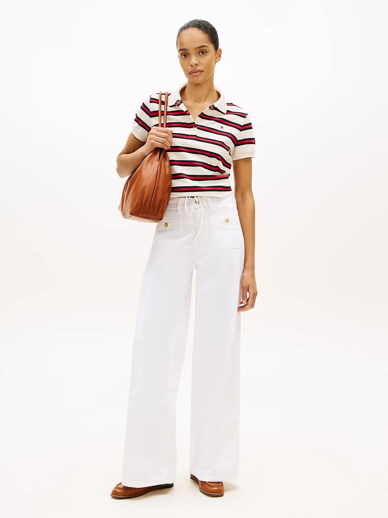 Tommy Hilfiger polo donna a righe in piqué di cotone stretch con laccetti regular fit in Polo Broadway Red - Barletta, commercioVirtuoso.it