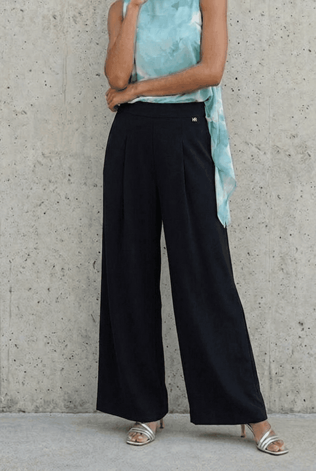 Pantalone largo con piegoni