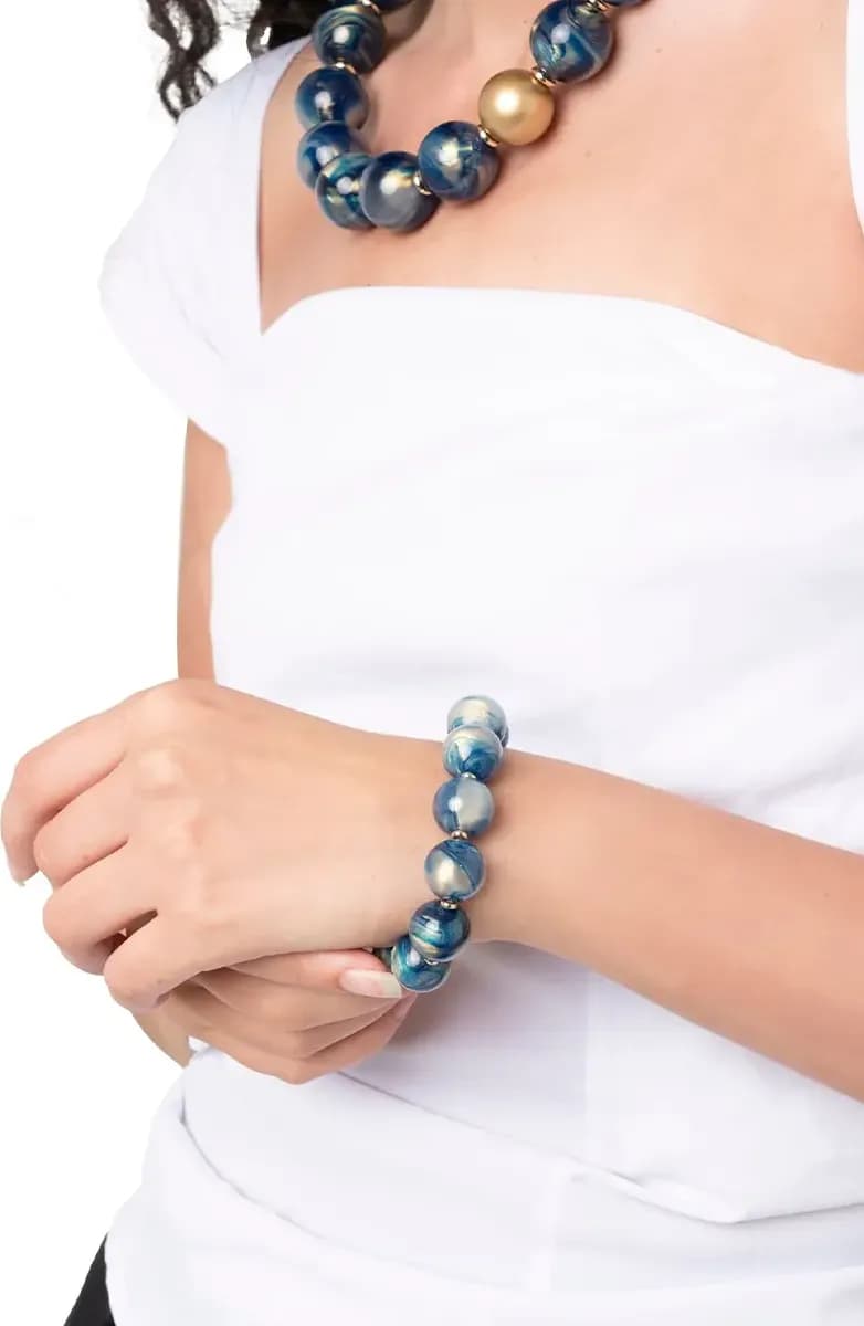 MYA ACCESSORIES | Bracciale elastico con sfere dalle nuances blu