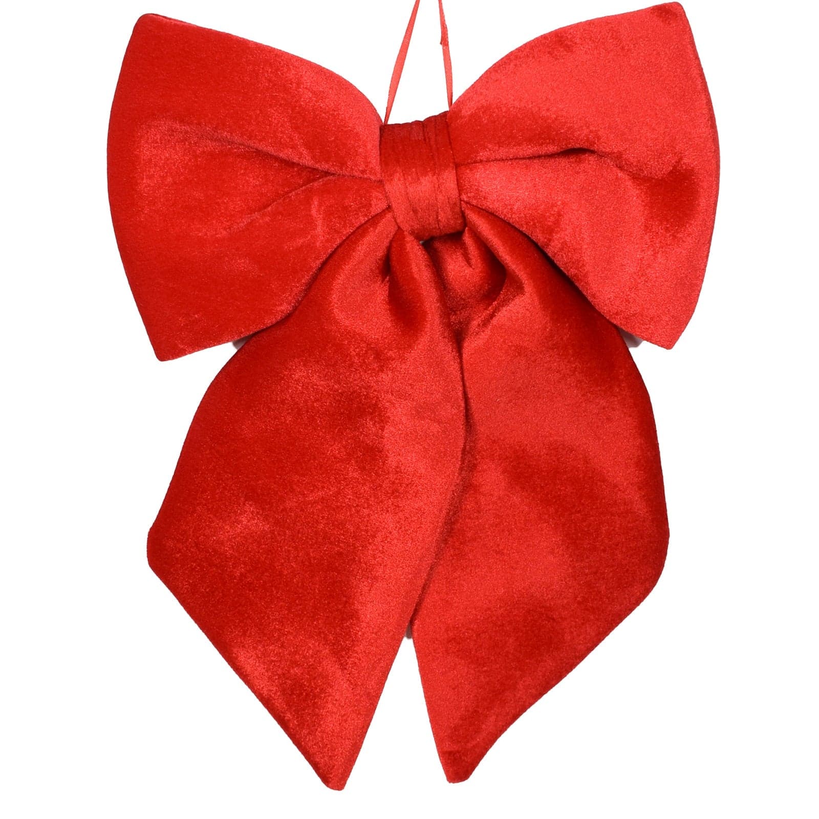 Fiocco rosso in velluto imbottito decorazione natalizia per albero e ghirlanda dietro porta
