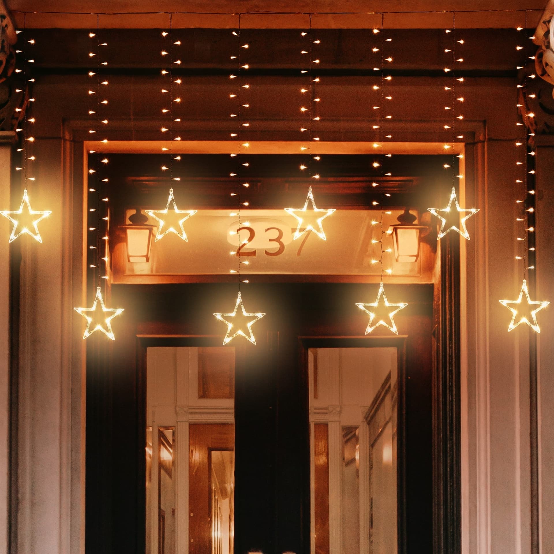 Cascata stalattite decorata con stelle luminose 620 Led luce bianco caldo cavo trasparente 500xH105cm - 4