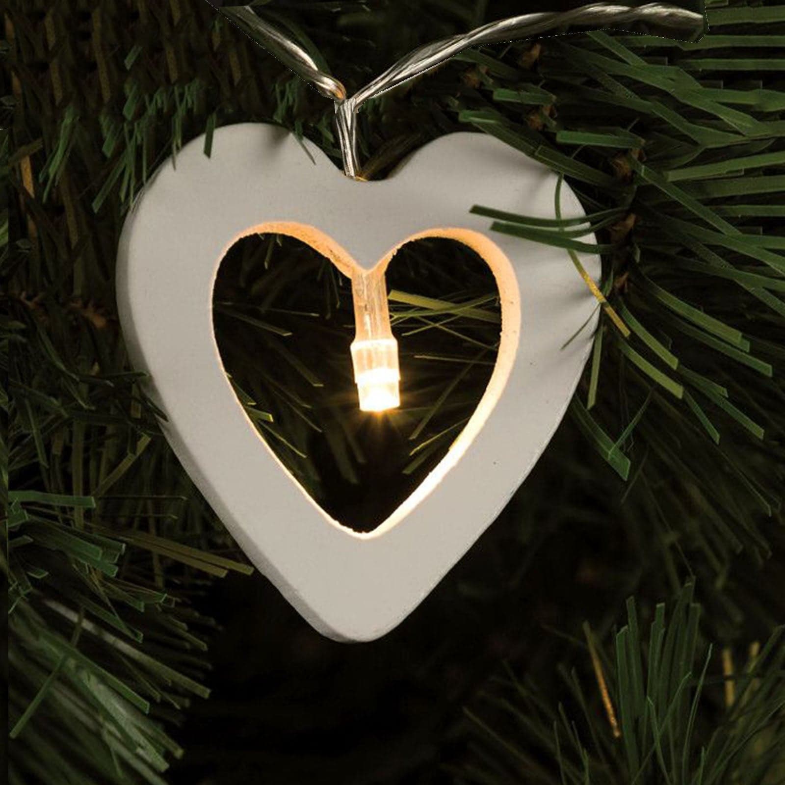 Catena con 10 led e soggetti in legno bianco per decorazioni natalizie - 2
