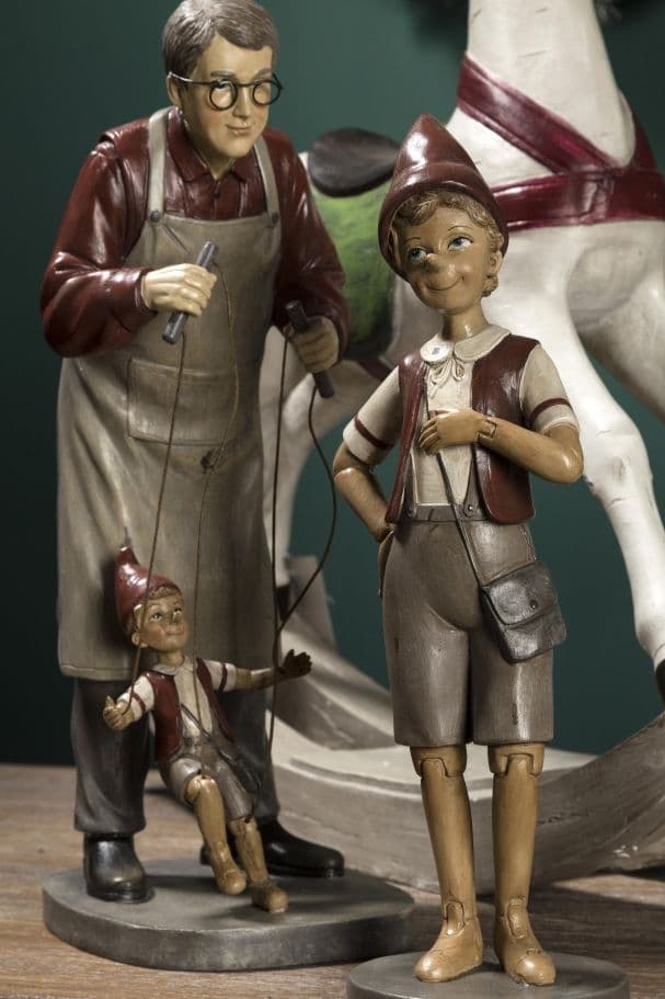 Statuetta "Pinocchio" con colori natalizi in poli-resina h 30 cm Storia Dino Bianchi 2021 - 2