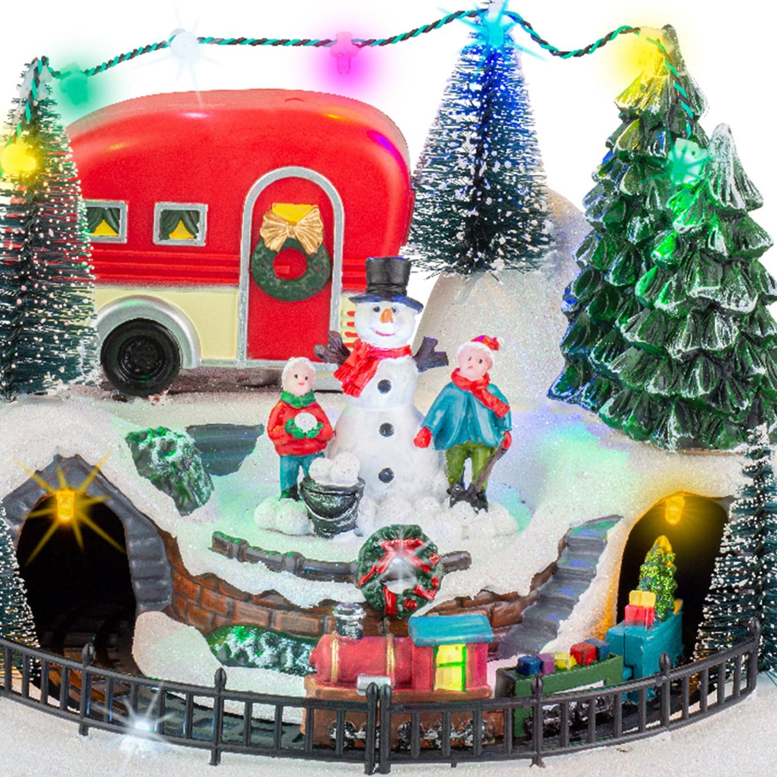 Scena animata per villaggio di Natale con personaggi con luci e movimento h 21 cm - 7