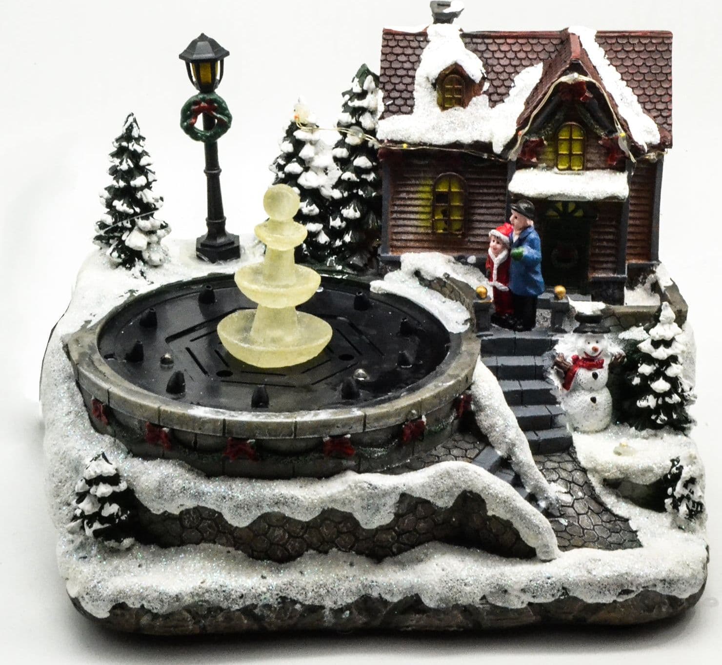 Scena natalizia con fontana luminosa per villaggio di Babbo Natale h 24 cm - 2