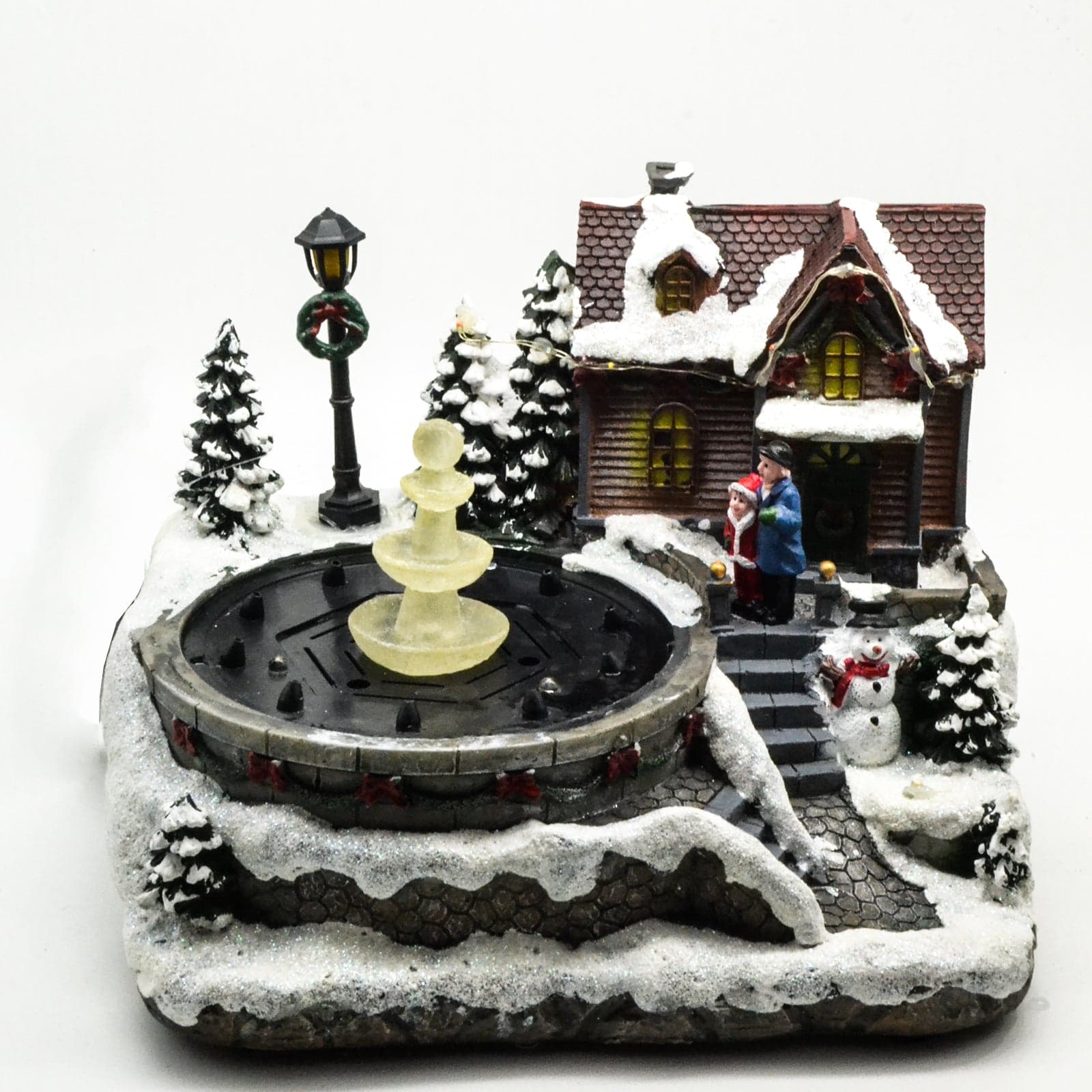 Scena natalizia con fontana luminosa per villaggio di Babbo Natale h 24 cm - 2