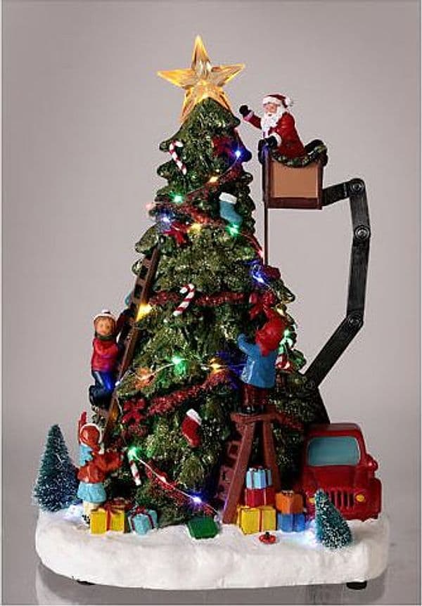 Scena animata a Led Babbo Natale che costruisce l'albero con i Regali, decorazione da 40 cm - 3