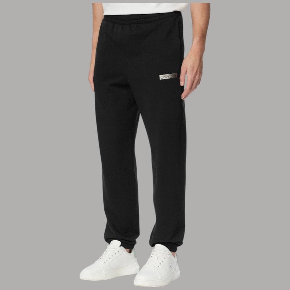 Pantaloni tuta Calvin Klein LV04LG212G con patch logo grafico - 10