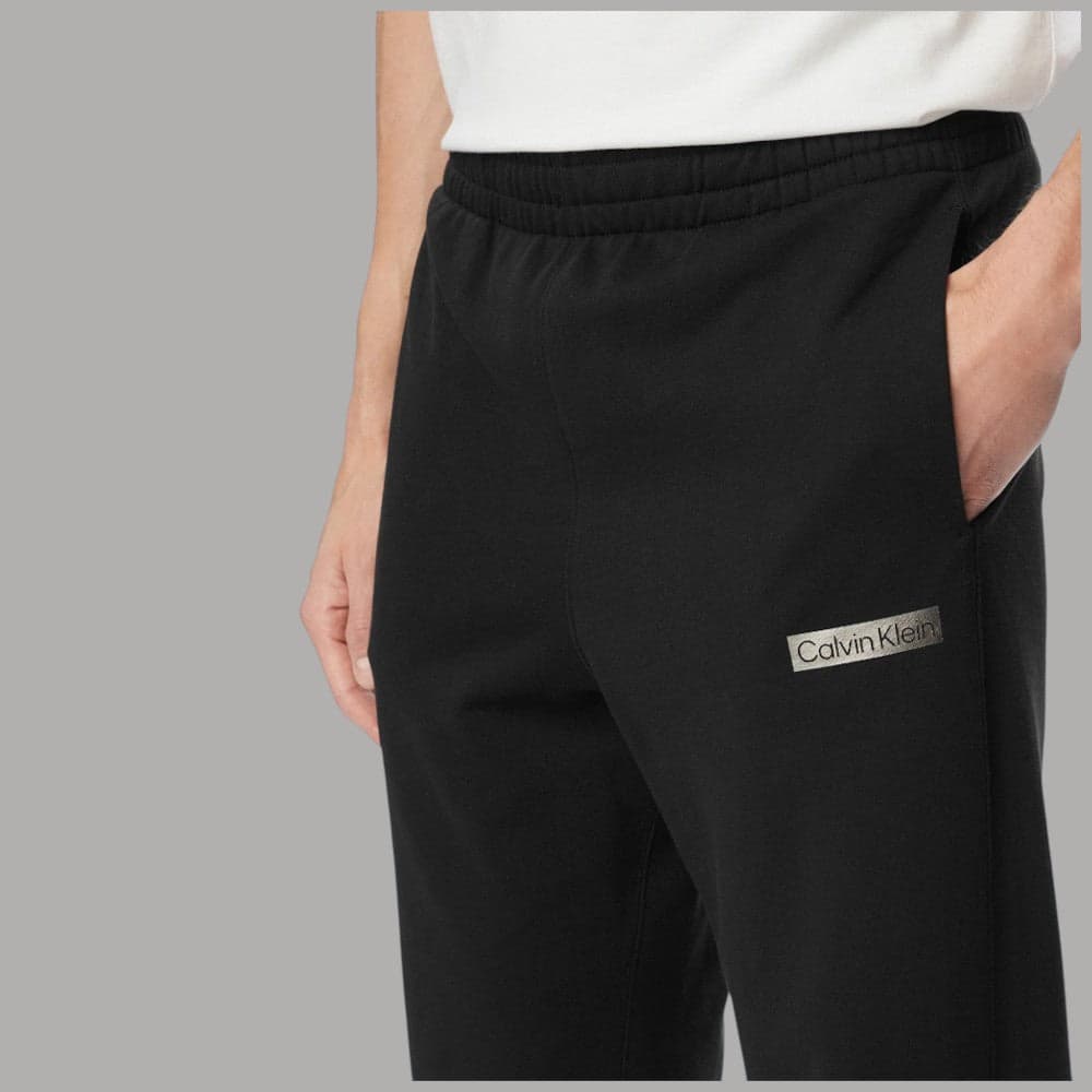 Pantaloni tuta Calvin Klein LV04LG212G con patch logo grafico - 2