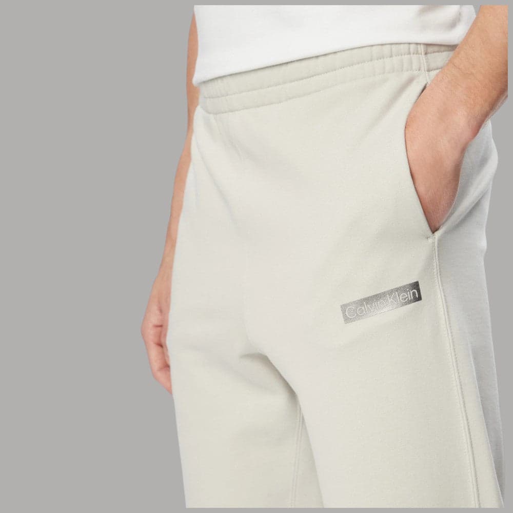 Pantaloni tuta Calvin Klein LV04LG212G con patch logo grafico - 6
