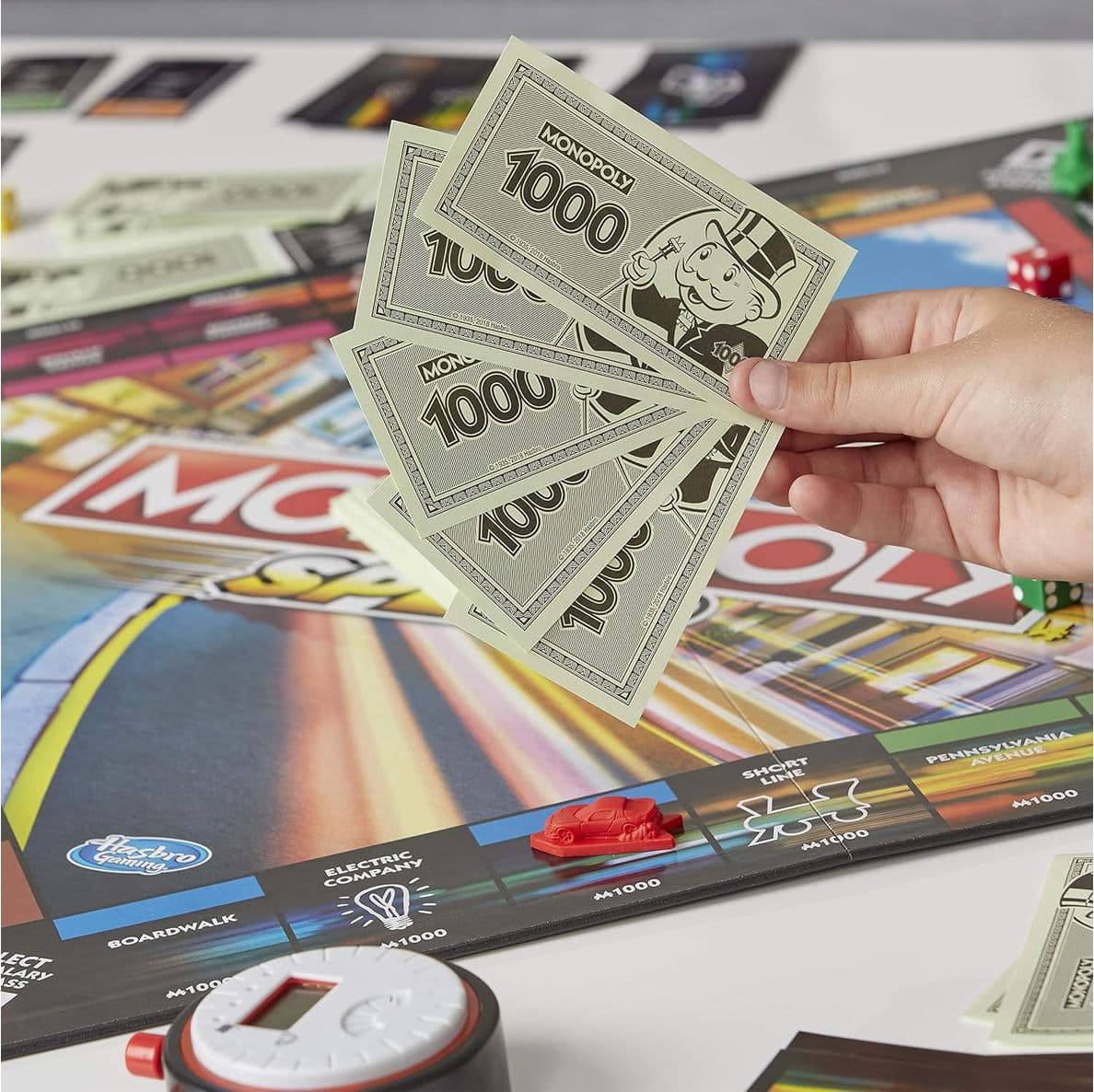 Monopoly Speed Hasbro Gaming Gioco da Tavolo Rapido Sotto i 10 Minuti con Timer Cronometrato e Turni Simultanei Regalo per Famiglie e Bambini dagli 8 Anni - 3