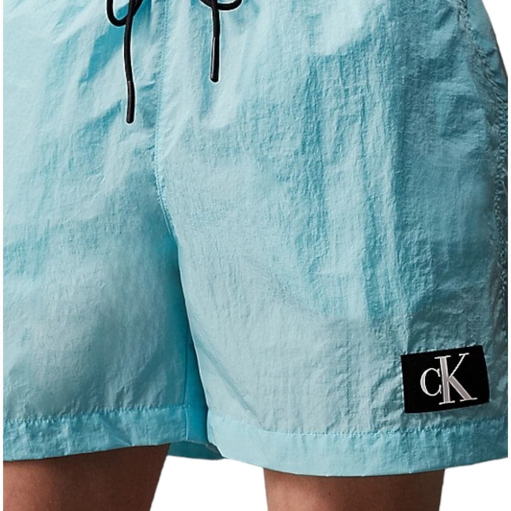 Calvin Klein costume celeste KM0KM00981 Costumi Calvin Klein