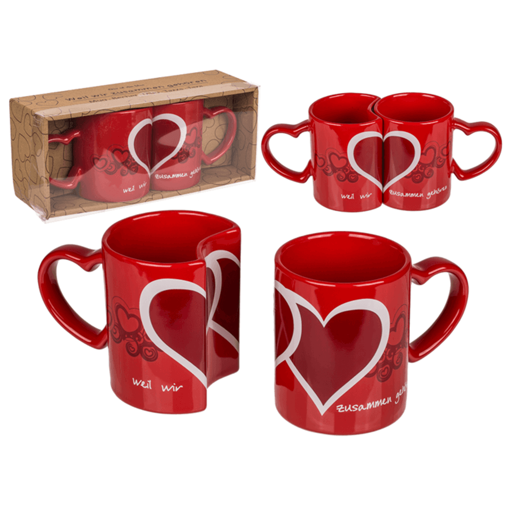 due tazze rosse a incastro con cuore per coppia di innamorati