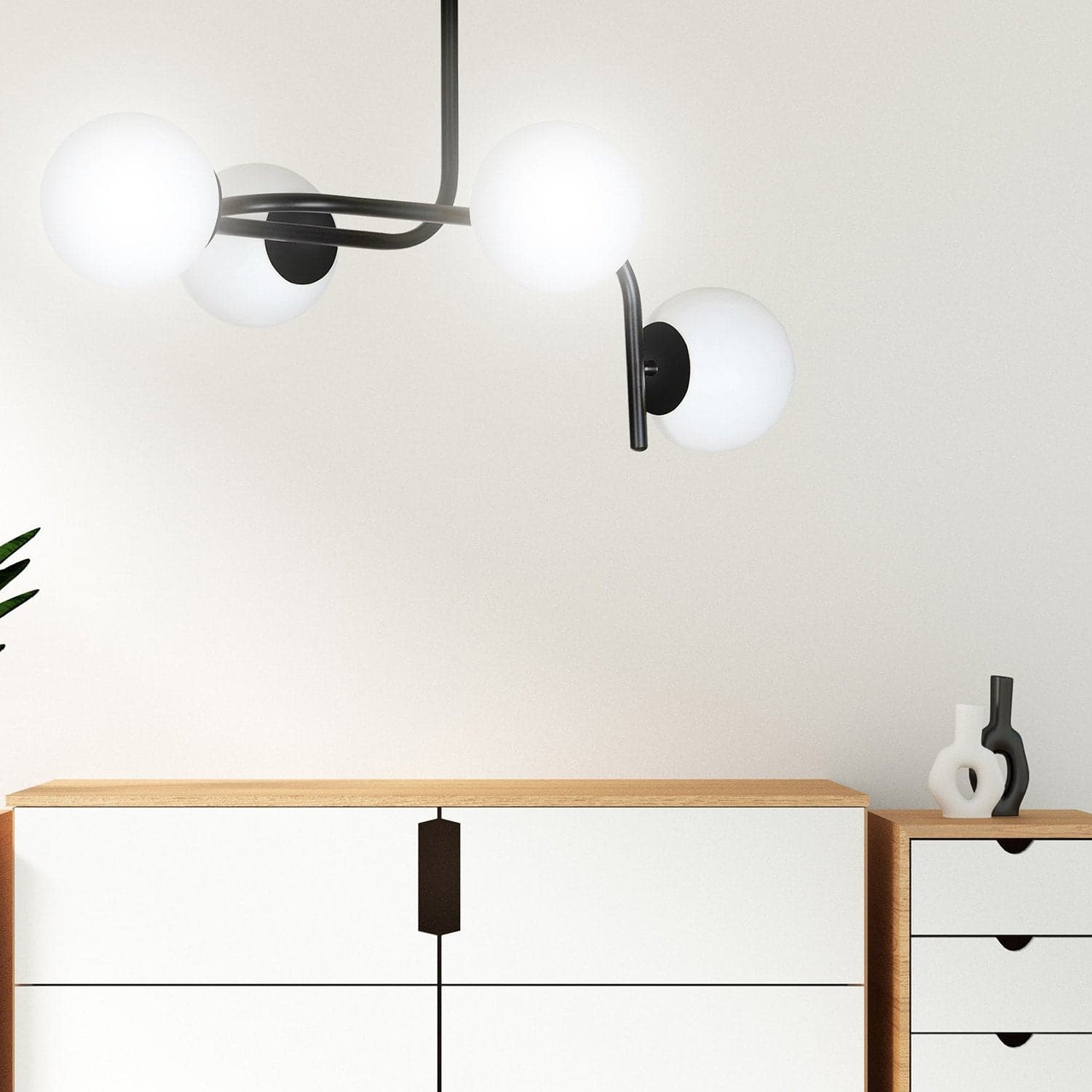 Lampadario 4 Luci Kalf In Acciaio Nero A Bracci Curvi E Sfere In Vetro Opalino in Lampade a sospensione LuceArt - Montecorvino Pugliano, commercioVirtuoso.it