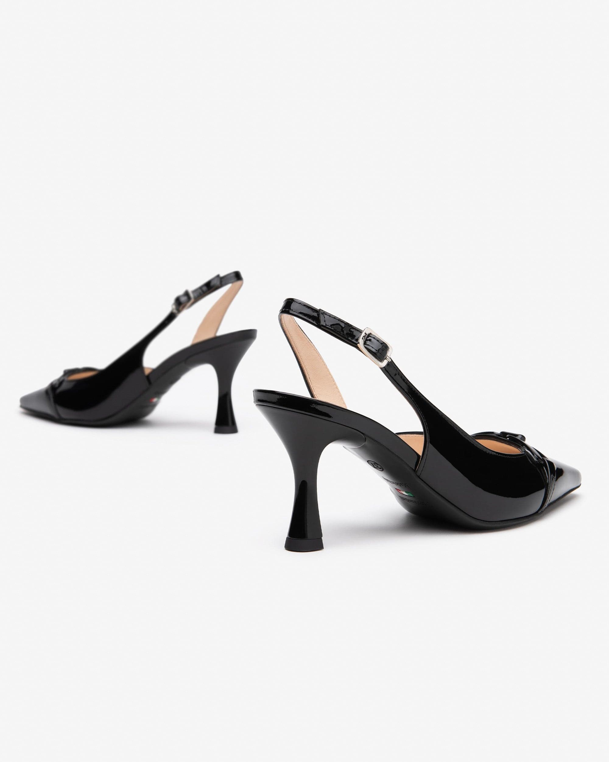 Nero Giardini slingback in vernice nero con accessorio E512230DE100 in Scarpe col tacco Teresi Calzature - Marsala, commercioVirtuoso.it