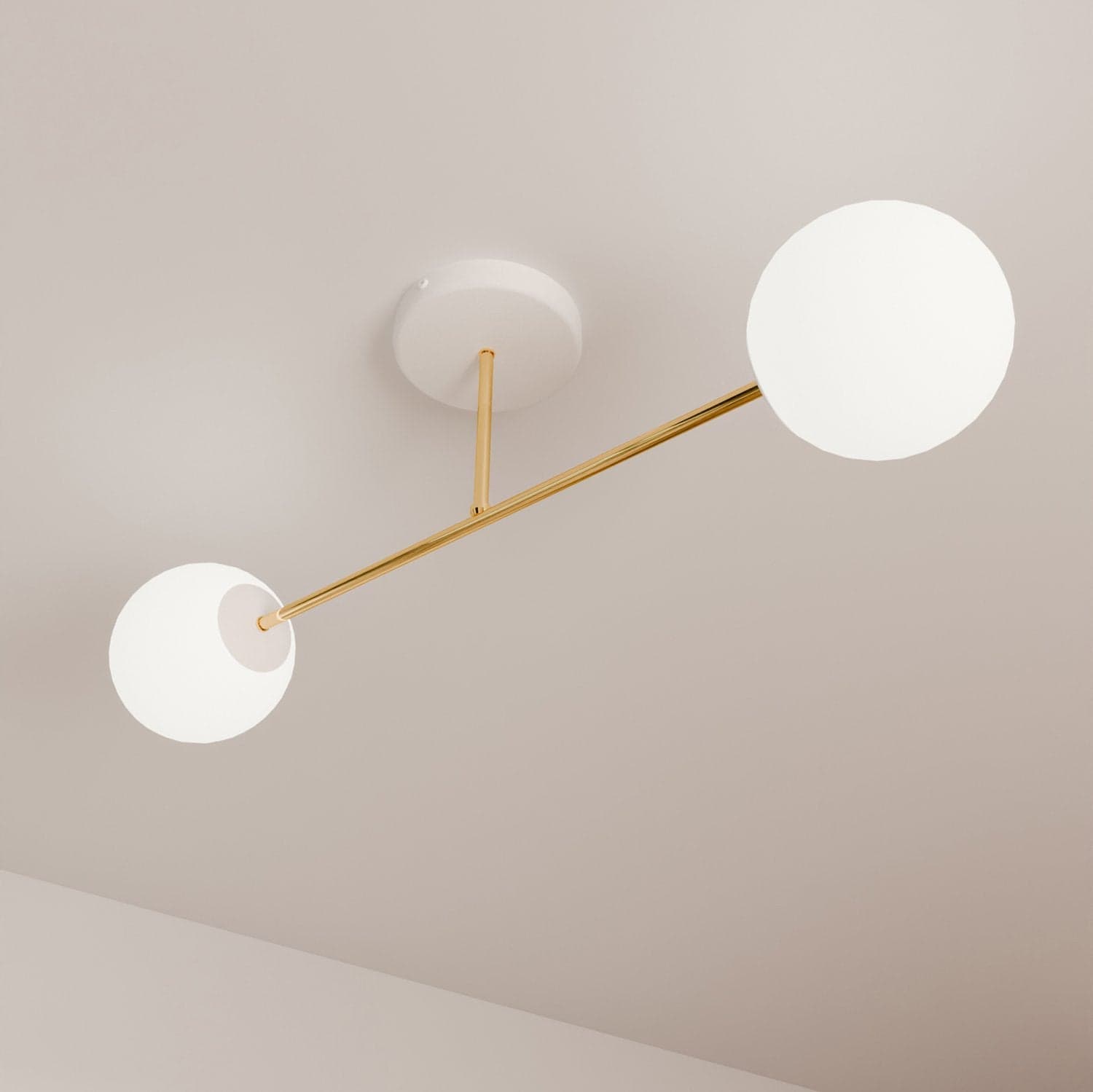 Plafoniera Moderna Magnium 2 Luci In Acciao Oro E Sfere In Vetro Bianco in Lampadari LuceArt - Montecorvino Pugliano, commercioVirtuoso.it