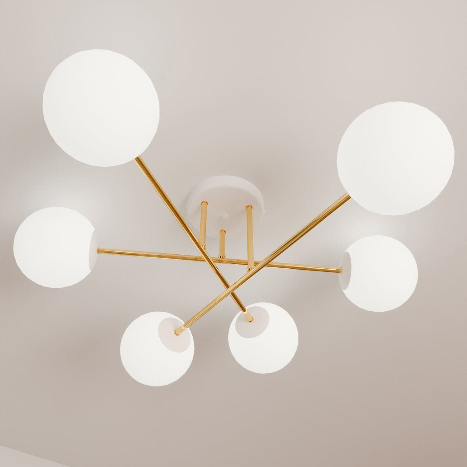 Plafoniera Moderna Magnium 6 Luci In Acciao Oro E Sfere In Vetro Bianco in Lampadari LuceArt - Montecorvino Pugliano, commercioVirtuoso.it