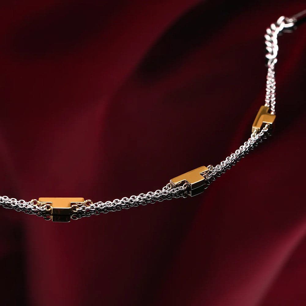 Bracciale TRUSSARDI donna T-Logo doppio acciaio / dorato in Bracciali Web Time Orologi - Milano, commercioVirtuoso.it