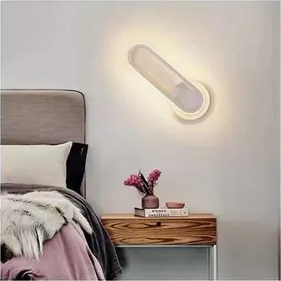 APPLIQUE DA PARETE LED 13W OVALE VERTICALE ORIENTABILE BIANCO LUCE NATURALE 50322 in Applique Trade Shop italia - Napoli, commercioVirtuoso.it