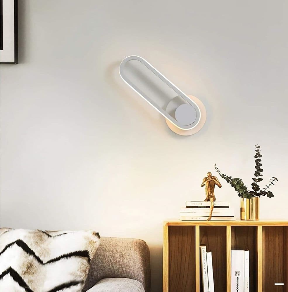 APPLIQUE DA PARETE LED 13 W OVALE VERTICALE ORIENTABILE BIANCO LUCE FREDDA 50339 in Applique Trade Shop italia - Napoli, commercioVirtuoso.it